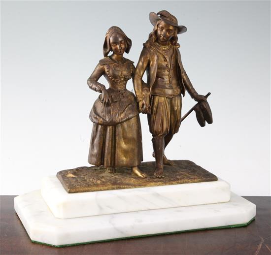 A late 19th century continental gilt bronze group of a gentleman and his wife, 11.5in.
